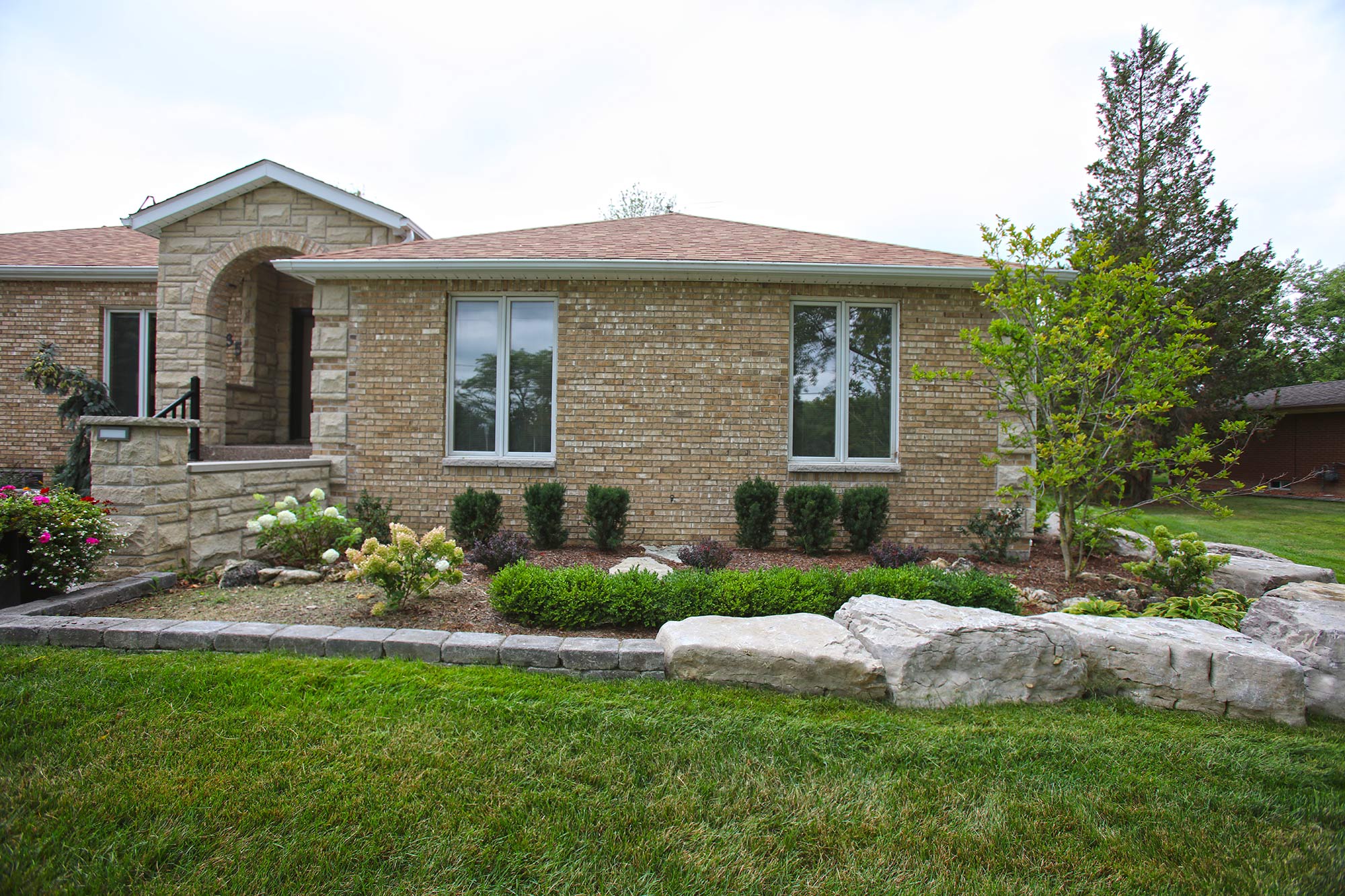 Front yard landscaping and stone work.